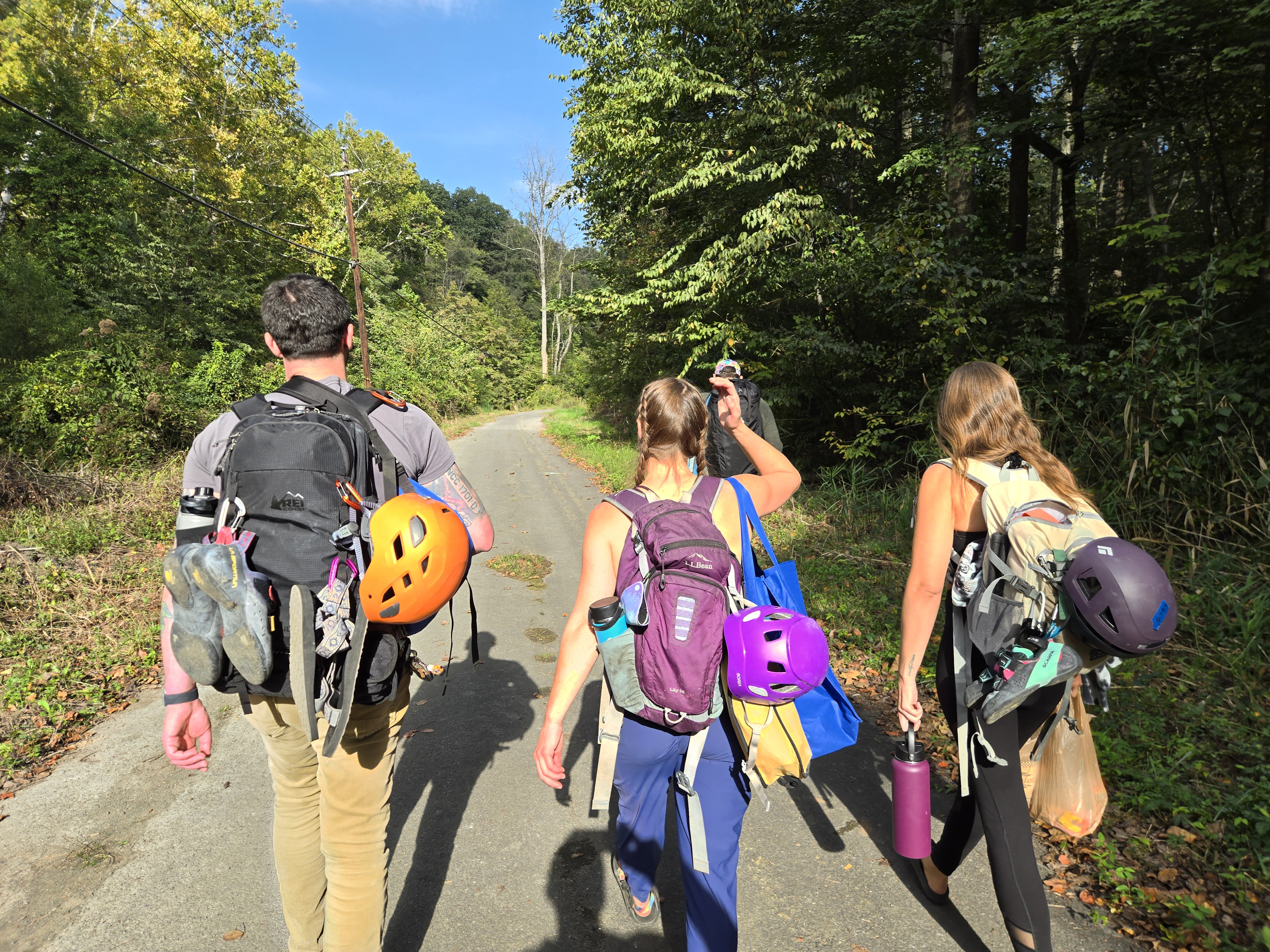 Climbers hiking out to the crag together
